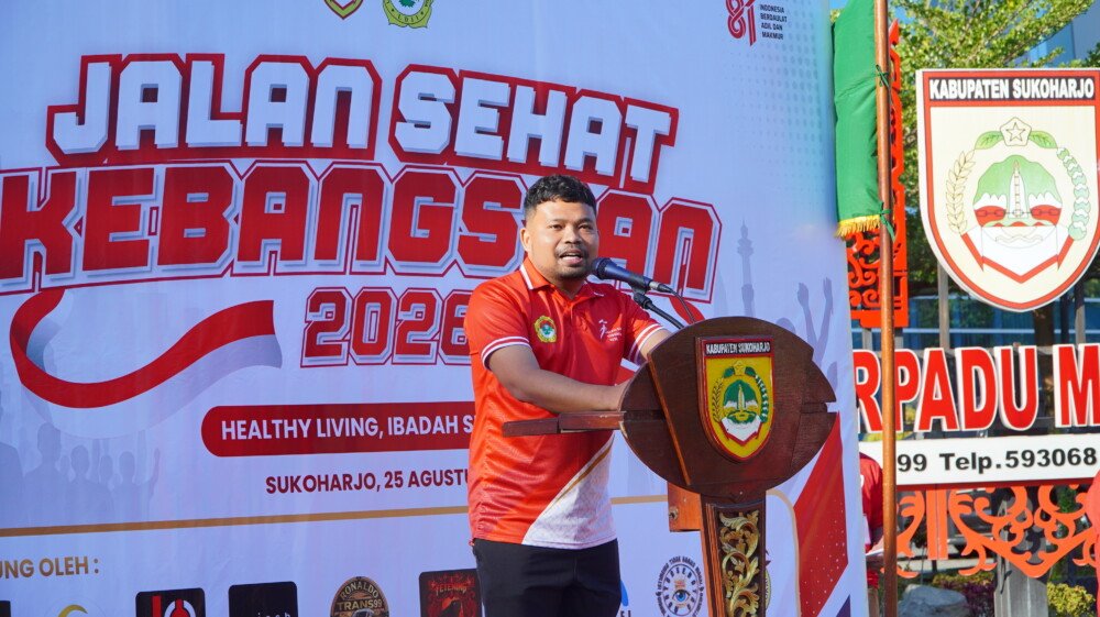 Machmud memberikan sambutan pada kegiatan Jalan Sehat Kebangsaan 2026